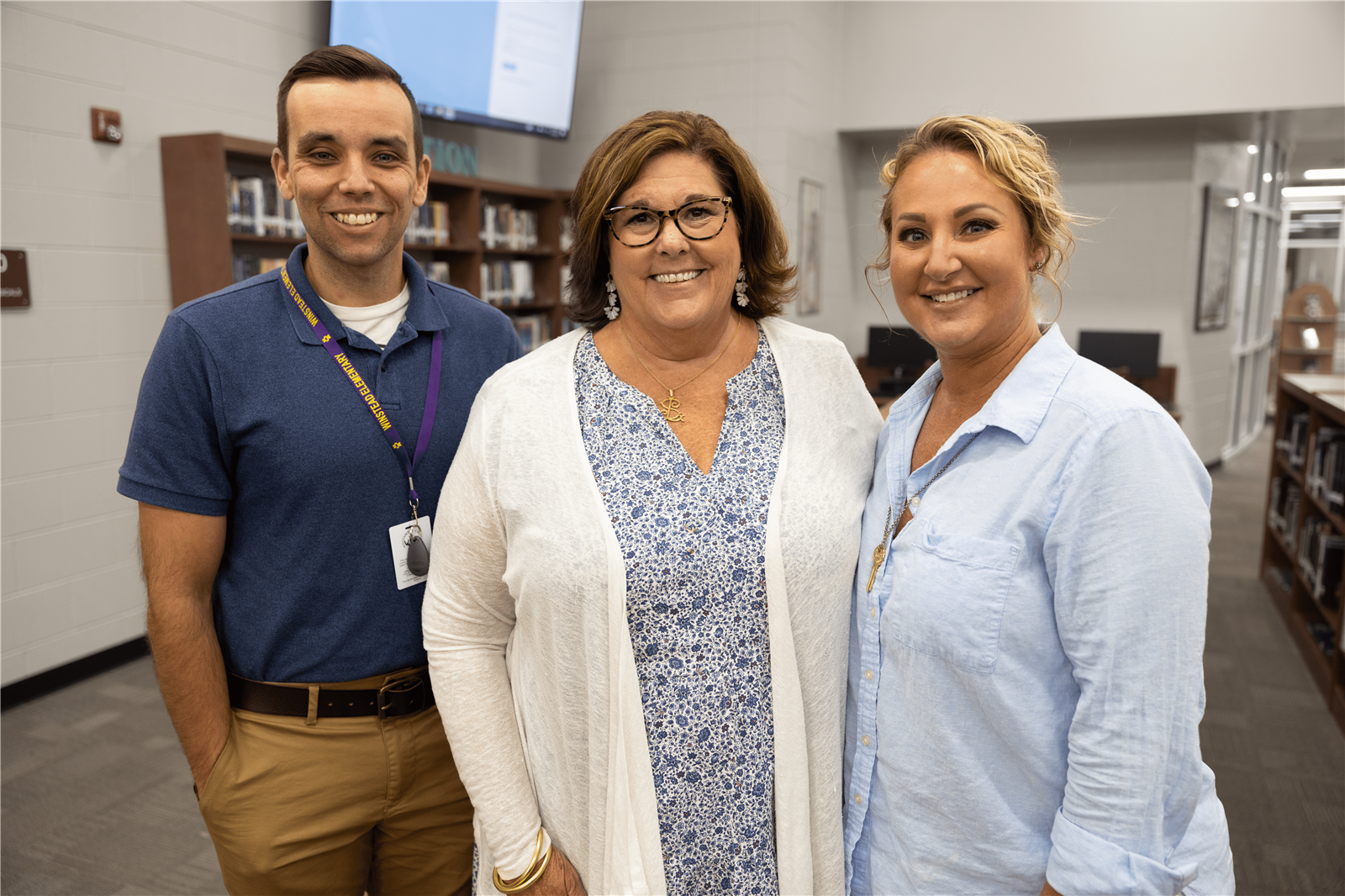 Principal and Assistant Principals smiling